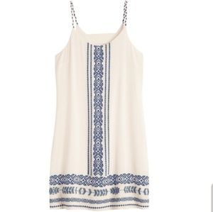 Skies are blue white /blue embroidered dress